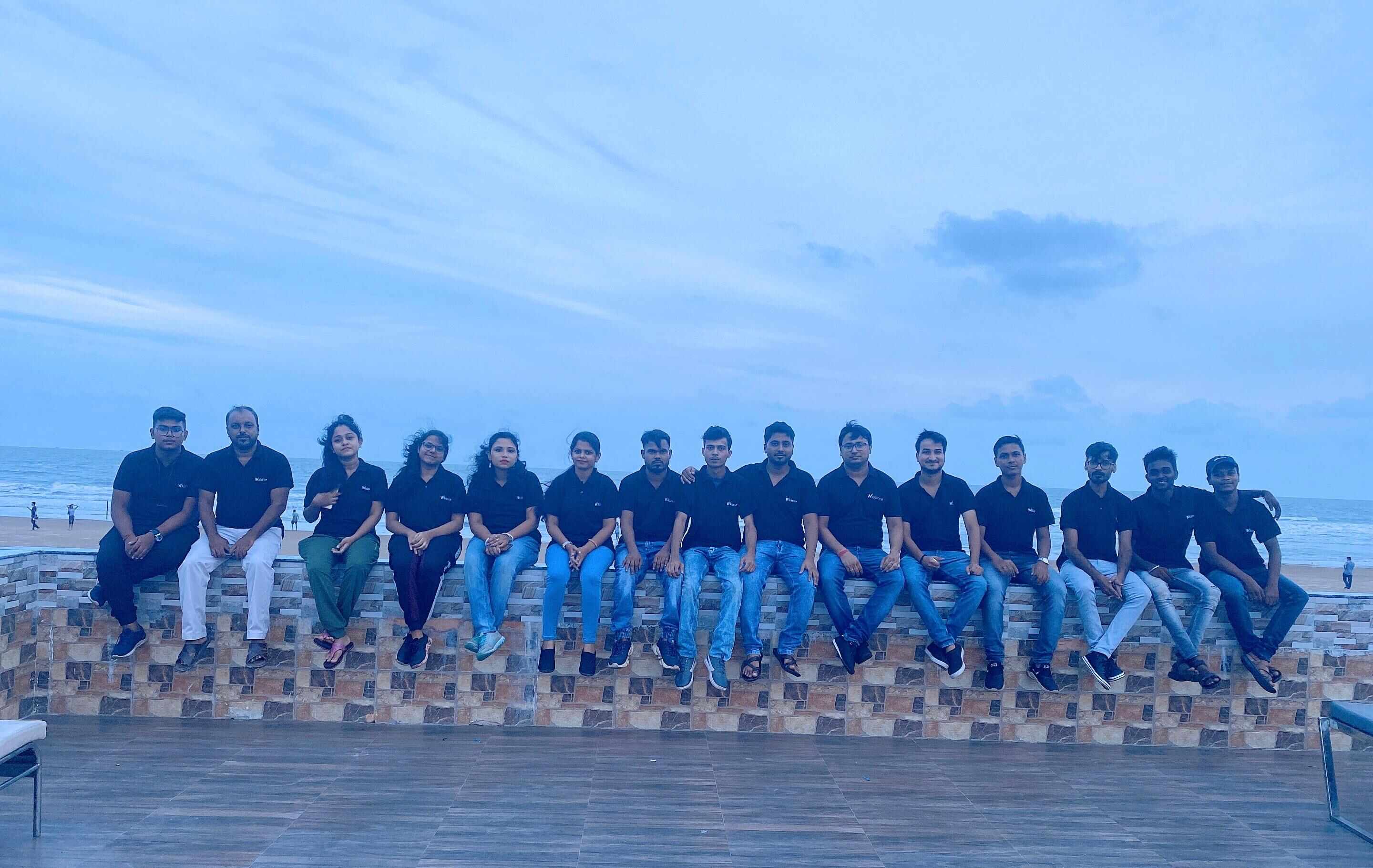 The early Wikiance team and interns by the sea