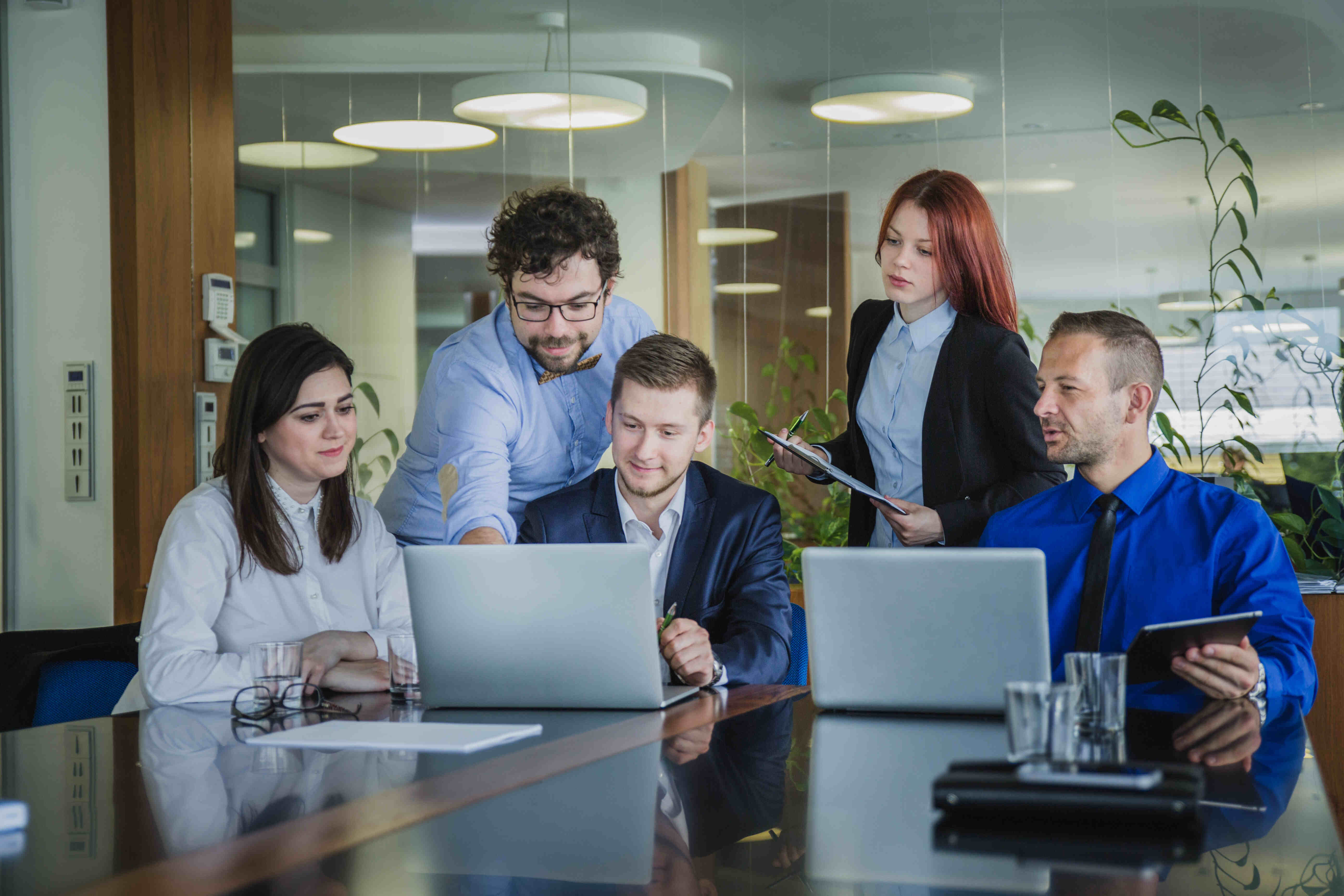 Pivetra team collaborating around a shared workspace
